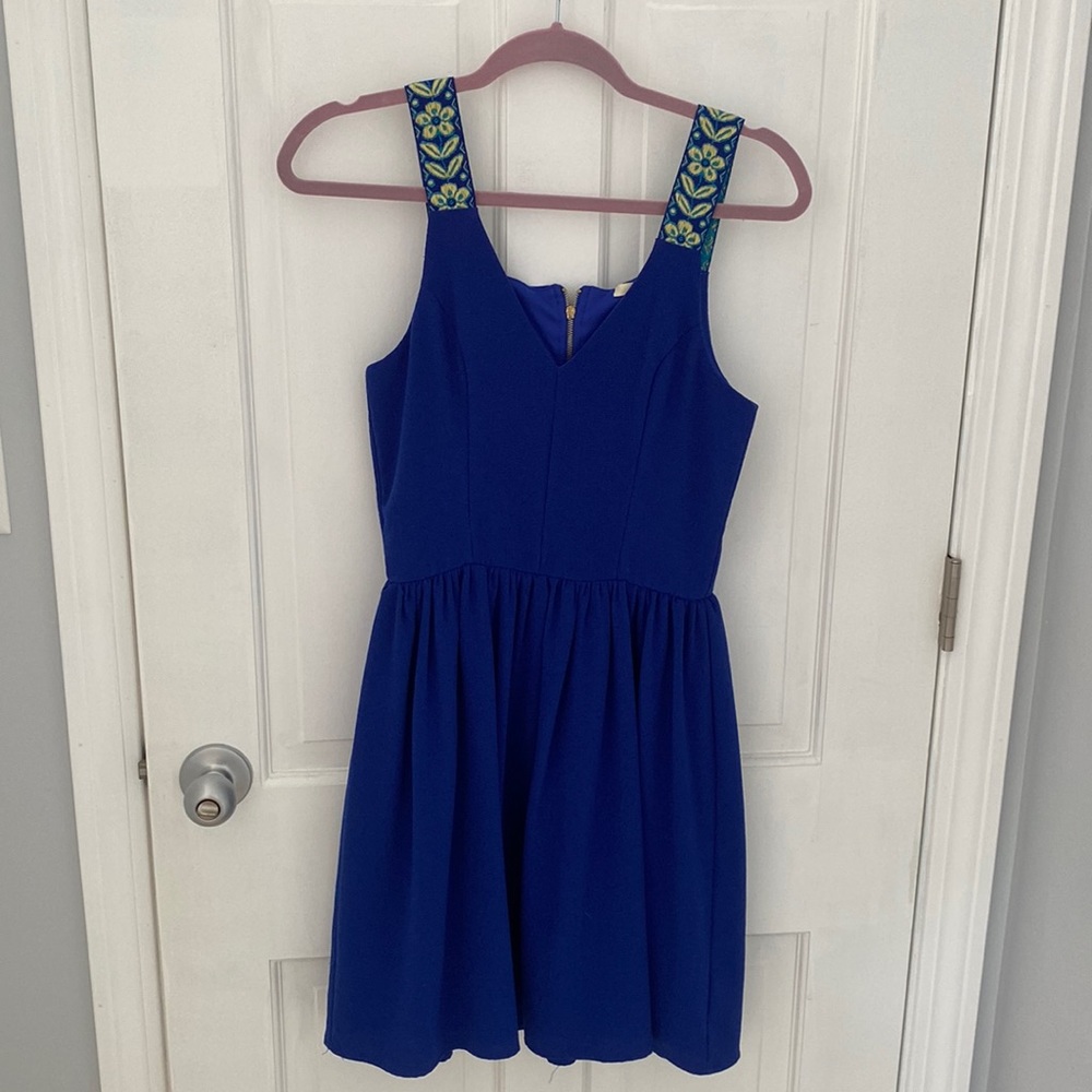 Blue peplum dress with flower embroidered shoulder straps